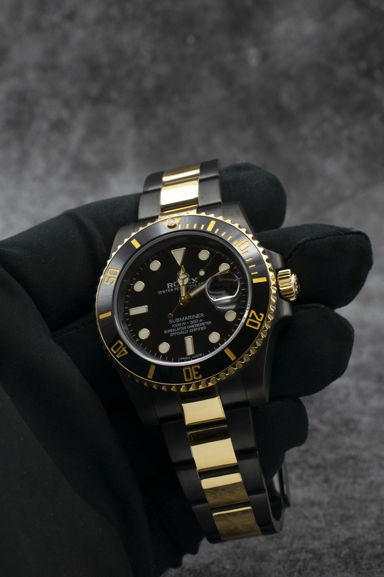 Rolex Submariner Acciaio Oro — al polso